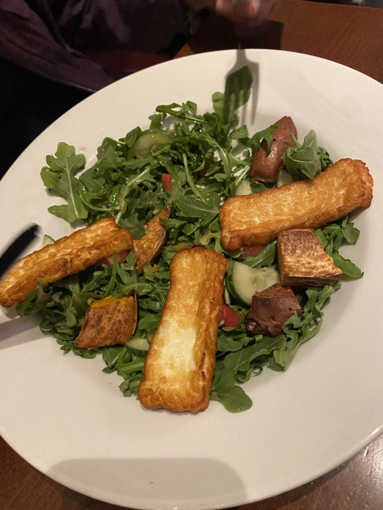 Image of the arugula salad with grilled halloumi available at The Old Bank in Northampton, England.